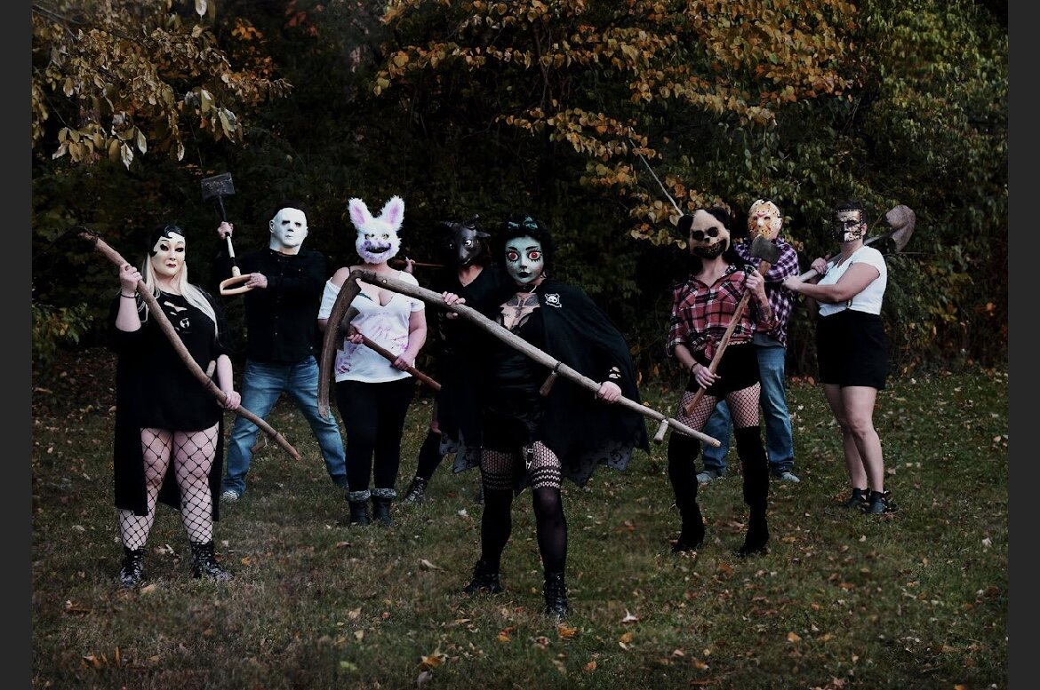 Friends in Halloween costumes outdoors
