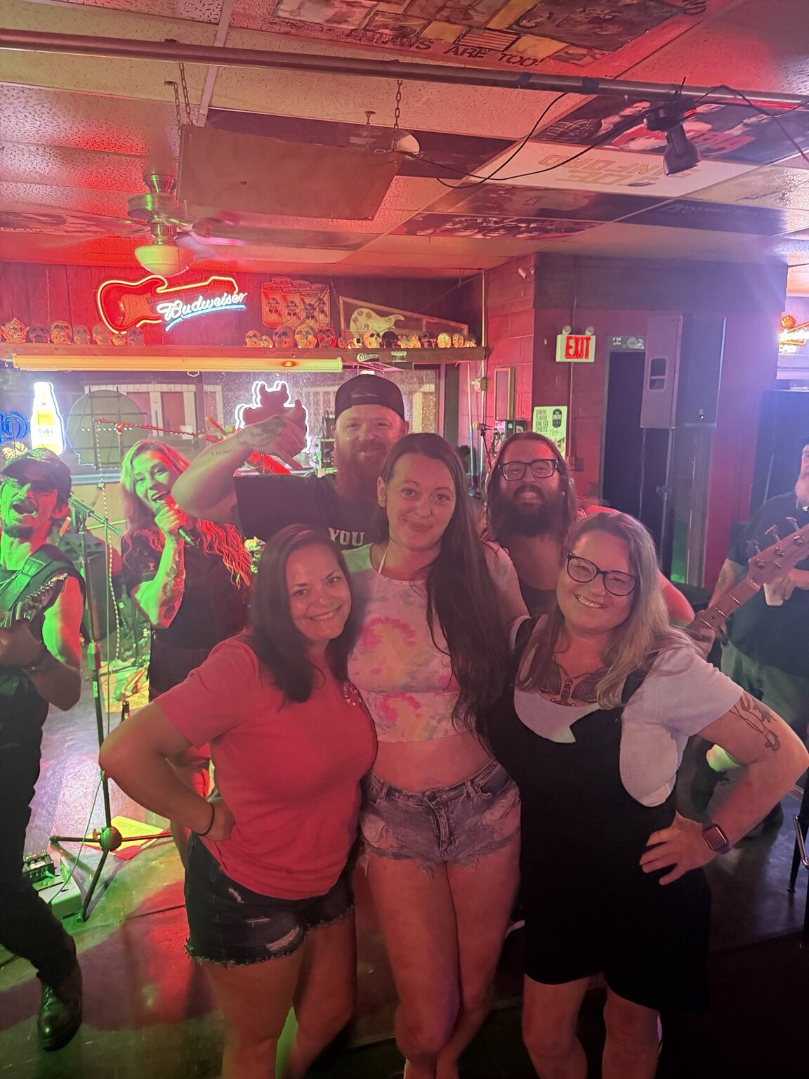 A group of friends posing inside Vinnie's