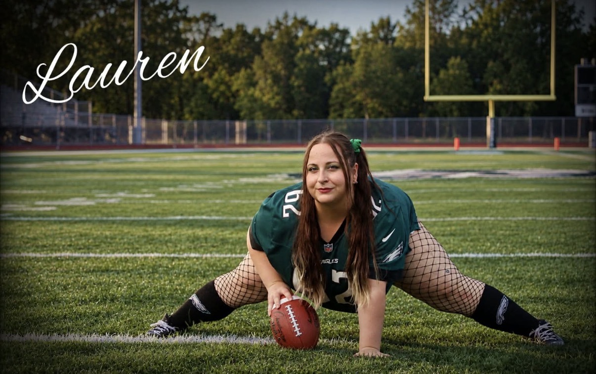 Lauren on a football field